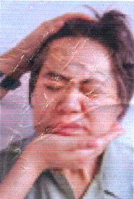 法輪功學員楊淼被強迫照相