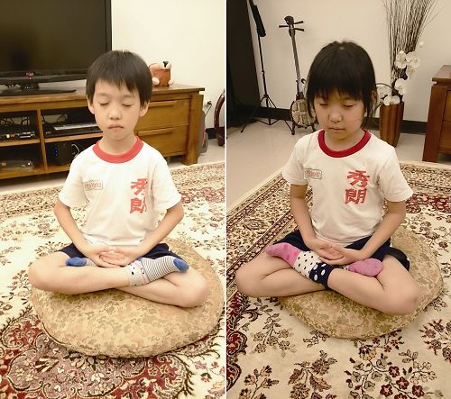 圖1.心明和弟弟子明倆都是法輪大法小弟子