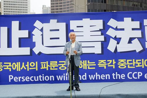 圖11：北韓人權信息中心董事長、人權活動家金尚憲表示，韓國各界人士反對中共迫害法輪功。