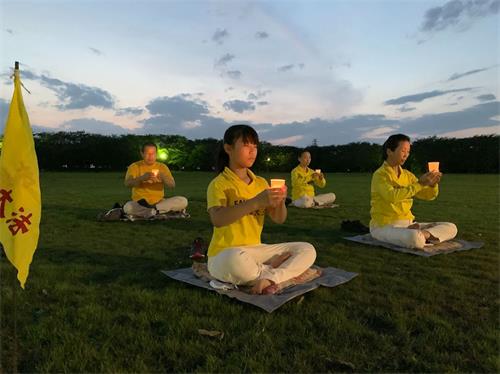 '圖10：熊谷煉功點學員舉行燭光守夜活動'
